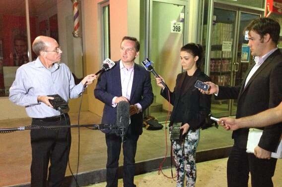 Labor's Chris Bowen talks to reporters after retaining is western Sydney seat