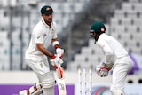 Glenn Maxwell  looks on in despair as his bails are removed by the Bangladesh wicketkeeper Mushfiqur Rahim.