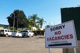 No vacancies sign for powered sites at Sunset Caravan Park in Mount Isa.