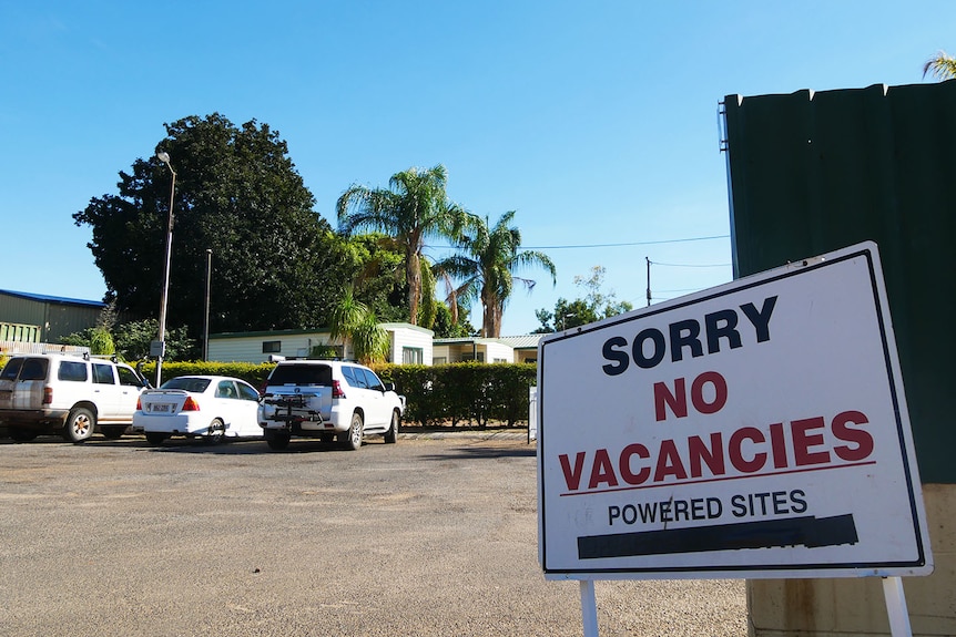 No vacancies sign for powered sites at Sunset Caravan Park in Mount Isa.