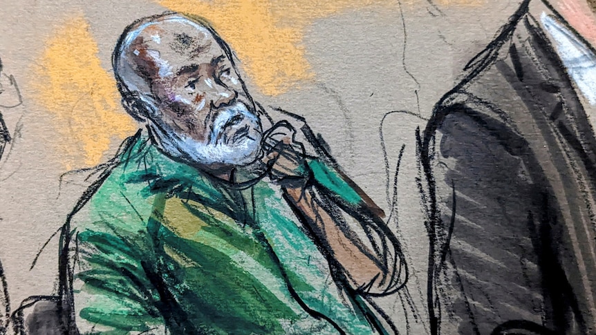 A courtroom sketch shows a bald, bearded man in a green top scratching his face with his left hand. 