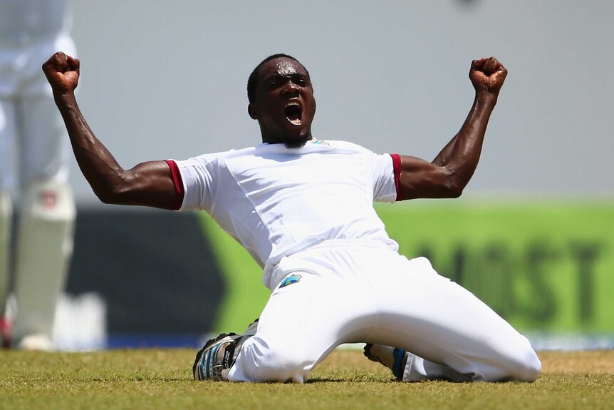 Jerome Taylor celebrates a wicket