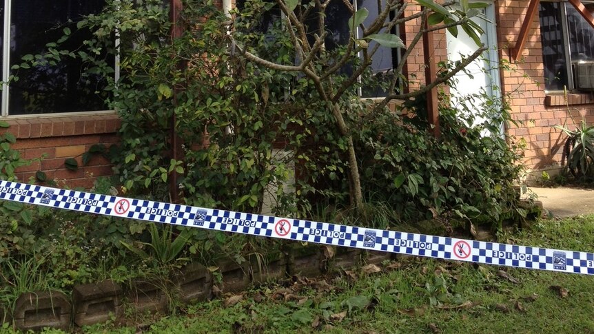 Police inspecting the scene of a murder in South Murwillumbah