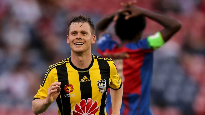 Wellington's Michael McGlinchey celebrates a goal for the Phoenix against the Newcastle Jets.