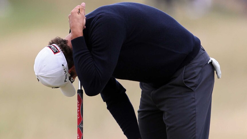 Australia's Adam Scott reacts after dropping a shot on the 13th green during the final round of the British Open