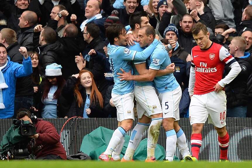 Manchester City celebrates Alvaro Negredo's goal against Arsenal