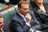 Tony Abbott and Julie Bishop listen to Wayne Swan's budget speech