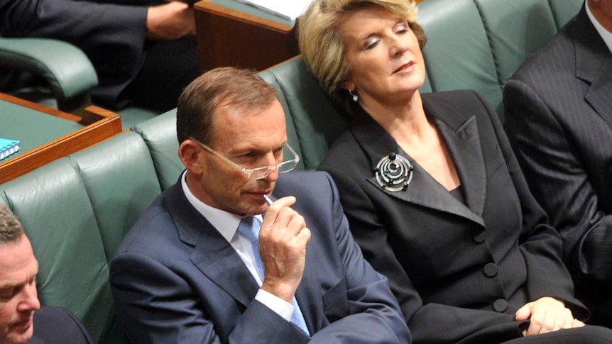 Tony Abbott and Julie Bishop listen to Wayne Swan's budget speech