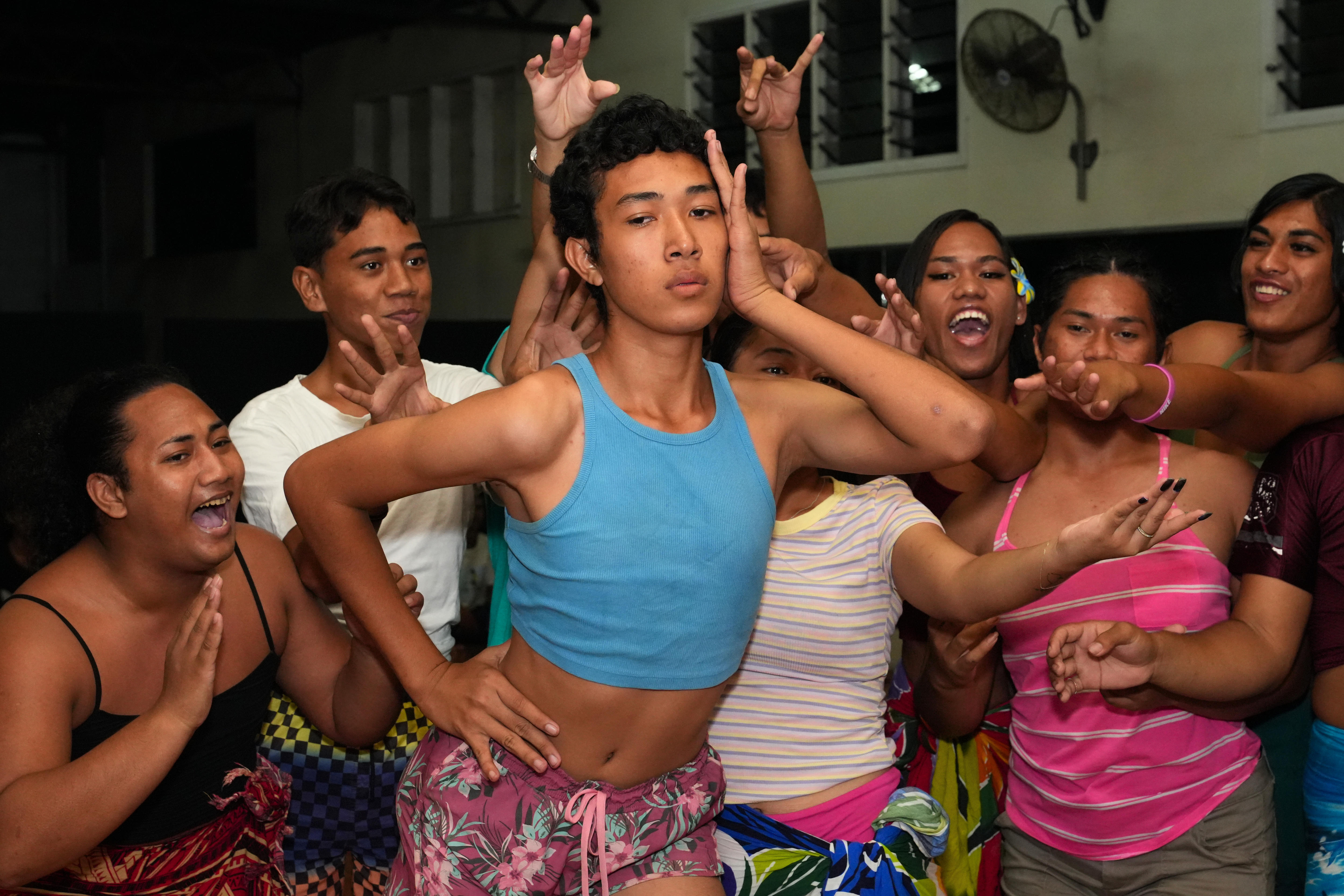 Group of Samoan youth pose for camera. 