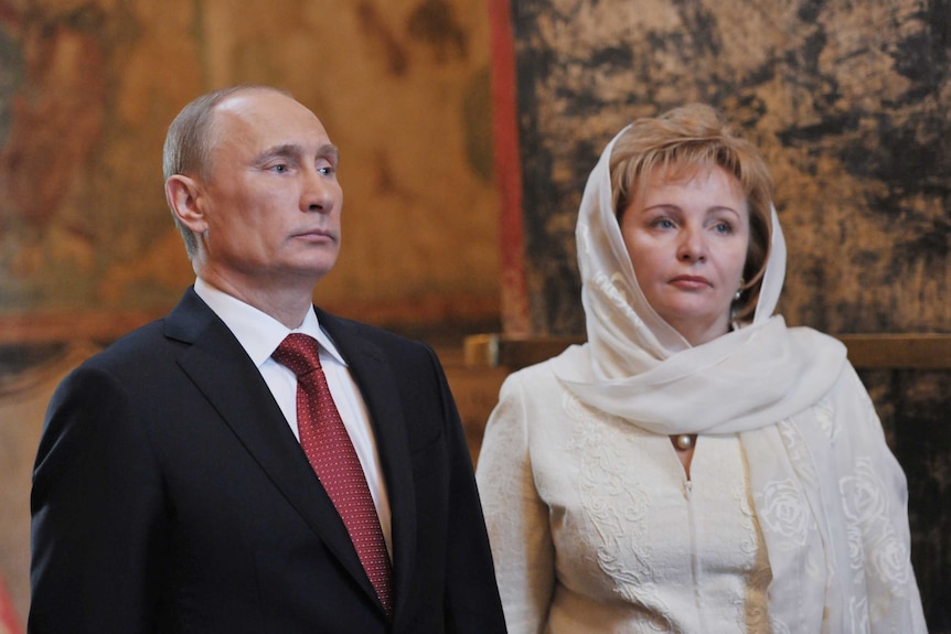 Russia's President Vladimir Putin and his wife Lyudmila attend at a cathedral in Moscow's Kremlin.