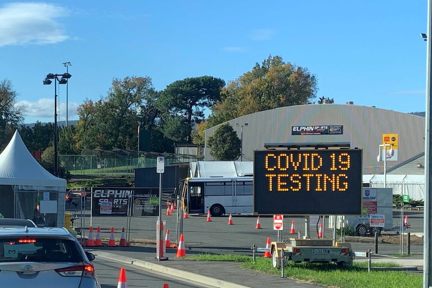 Cars lined up in the Elphin Sport Centre car park for coronavirus testing