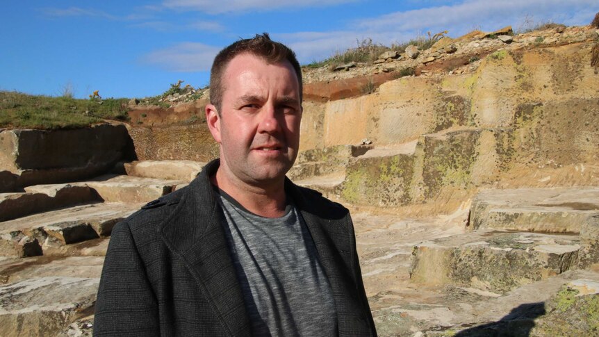 Archaeologist Brad Williams at the Ross sandstone quarry site.