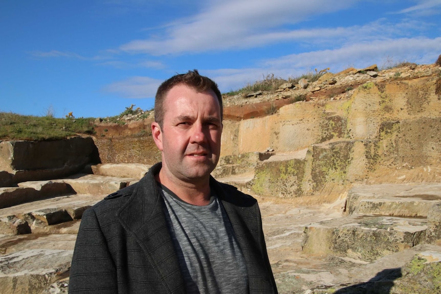 Archaeologist Brad Williams at the Ross sandstone quarry site.