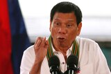 Philippine President Rodrigo Duterte addresses army troopers