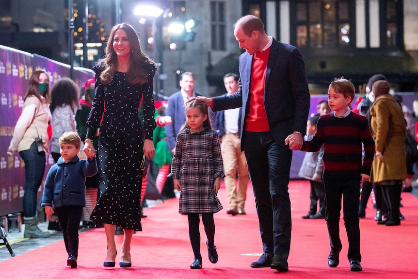 Prince William and wife Catherine walk the red carpet with their kids Louis, Charlotte and George.