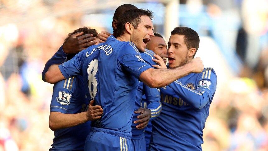 Sign him up ... Frank Lampard celebrates after scoring Chelsea's third goal against Brentford.
