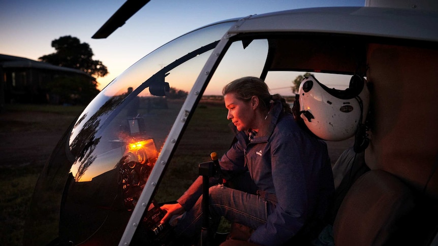Nina Hardie in the cockpit of her two-seater helicopter
