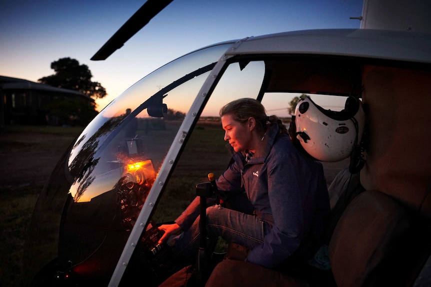 Nina Hardie in the cockpit of her two-seater helicopter