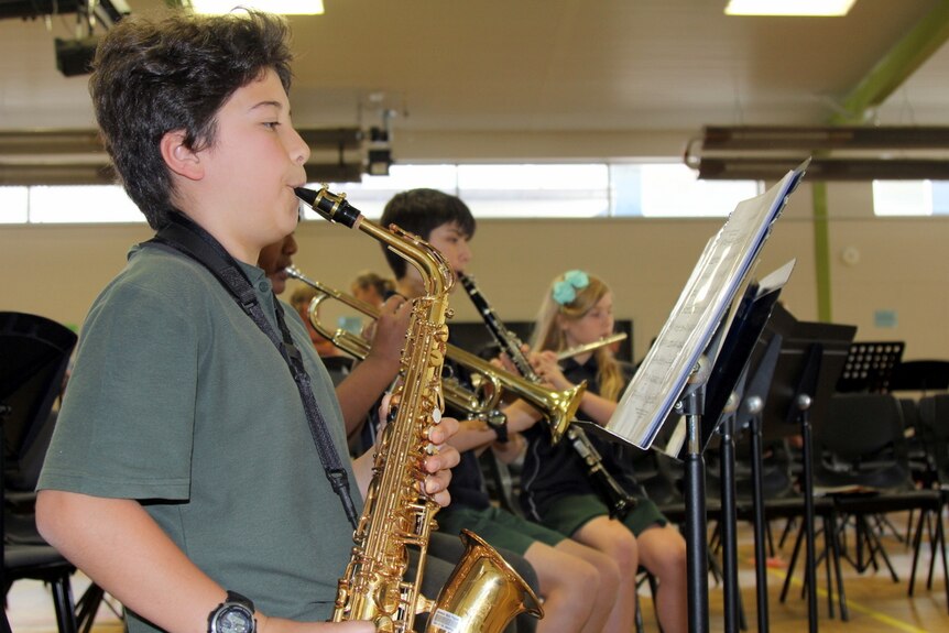 Student plays the saxophone