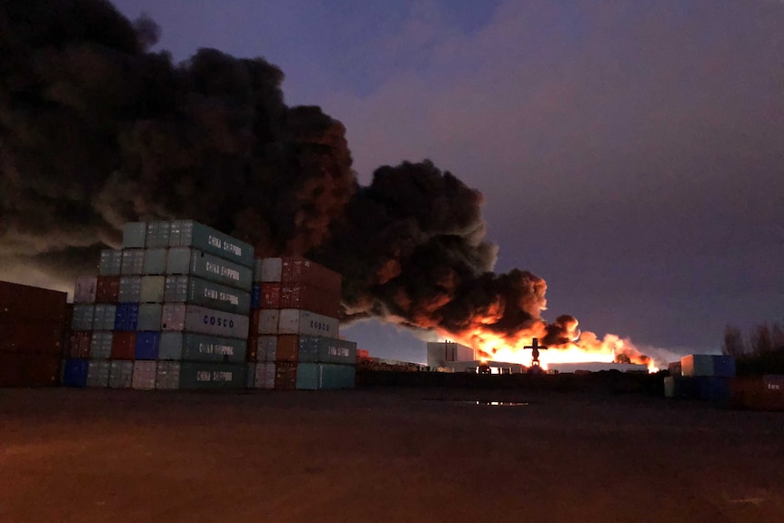 Thick smoke and flames billow from the factory fire in West Footscray.