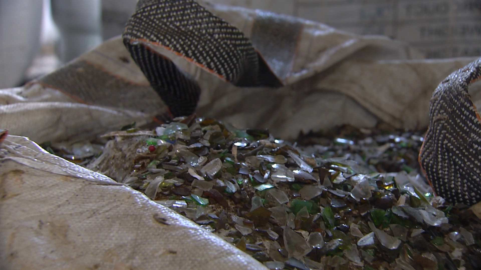 Recycling companies stockpiling thousands of tonnes of glass as cheap