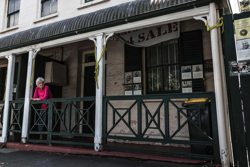 Florence Seckold in front of her house