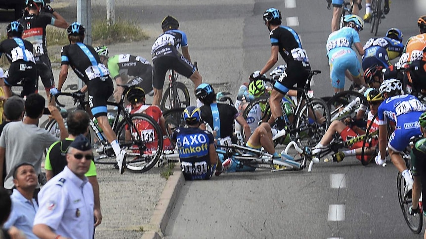 Tour de France cyclists crash on first stage