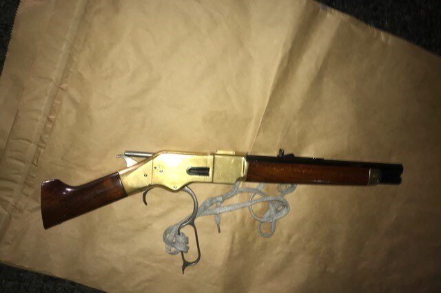 Police say they also found a sawn-off rifle and ammunition