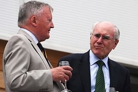 Former Australian prime minister John Howard and ICC President David Morgan look on during day one of the 1st Ashes Test Matc...