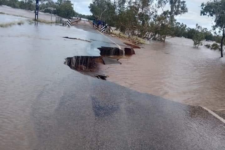Part of a road in Fitzroy Crossing has been washed away due to record flood levels.