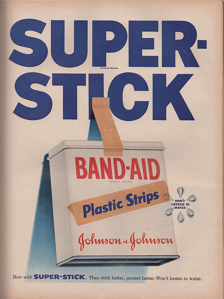 A vintage advertisement of Band-Aids that reads: "Super Stick"