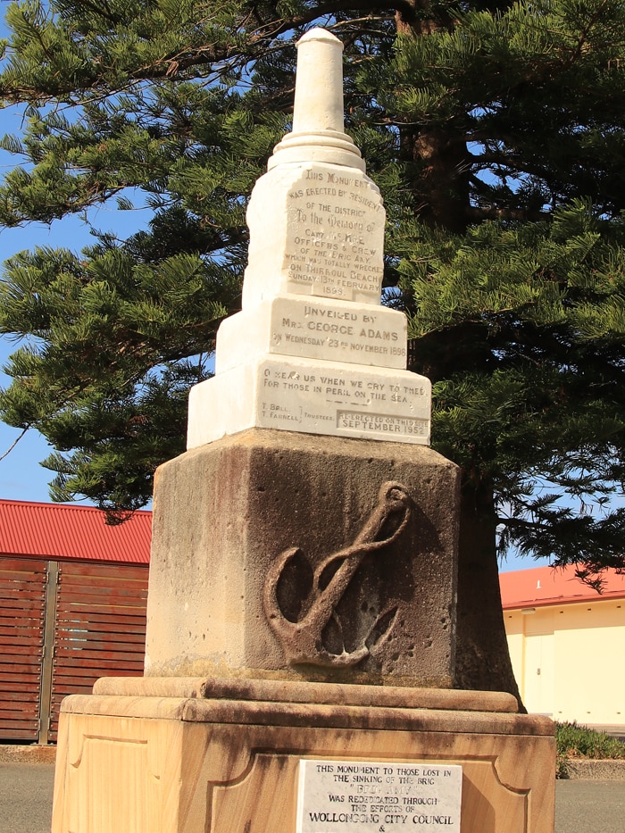 The Amy monument in the Thirroul beach car park on a sunny day.