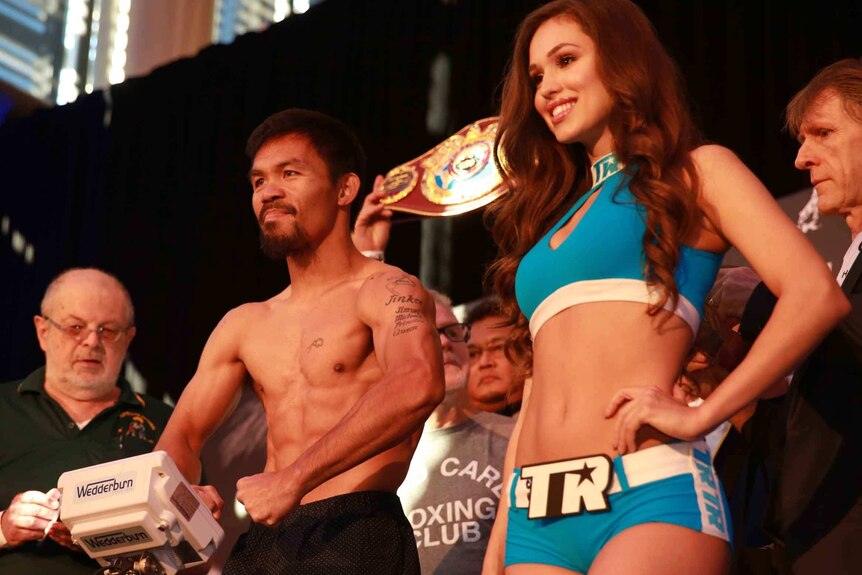 Manny Pacquiao weighs in ahead of the WBO welterweight championship bout against Jeff Horn.