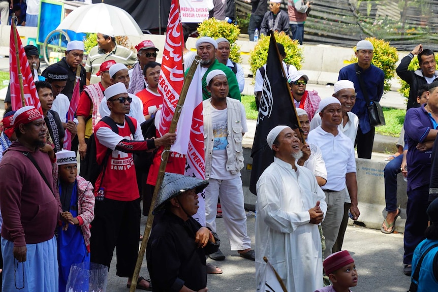 A crowd gathering in protest