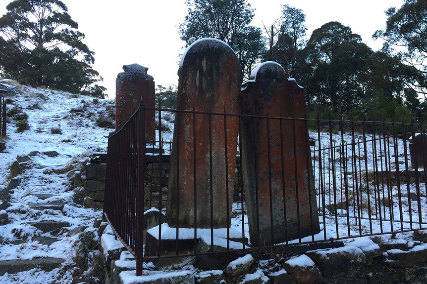 Ice on gravestones.