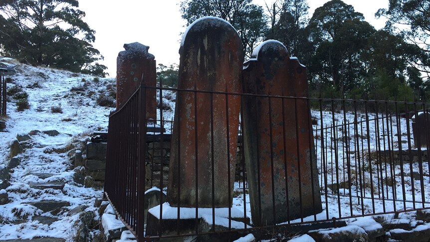 Ice on gravestones.