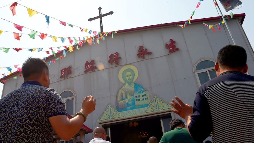 Chinese attend the 'underground' Zhongxin Bridge Catholic Church