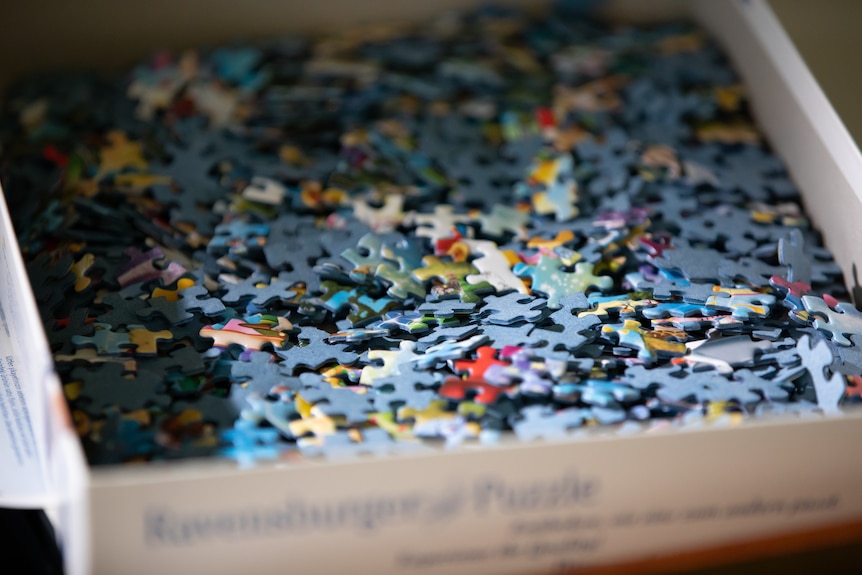 Close up of puzzle pieces in a box