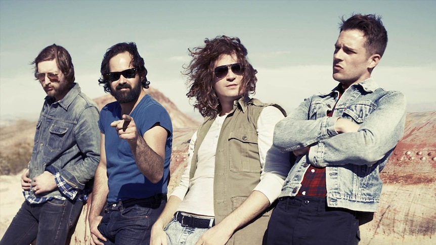 The Killers posing in a 2006 press shot