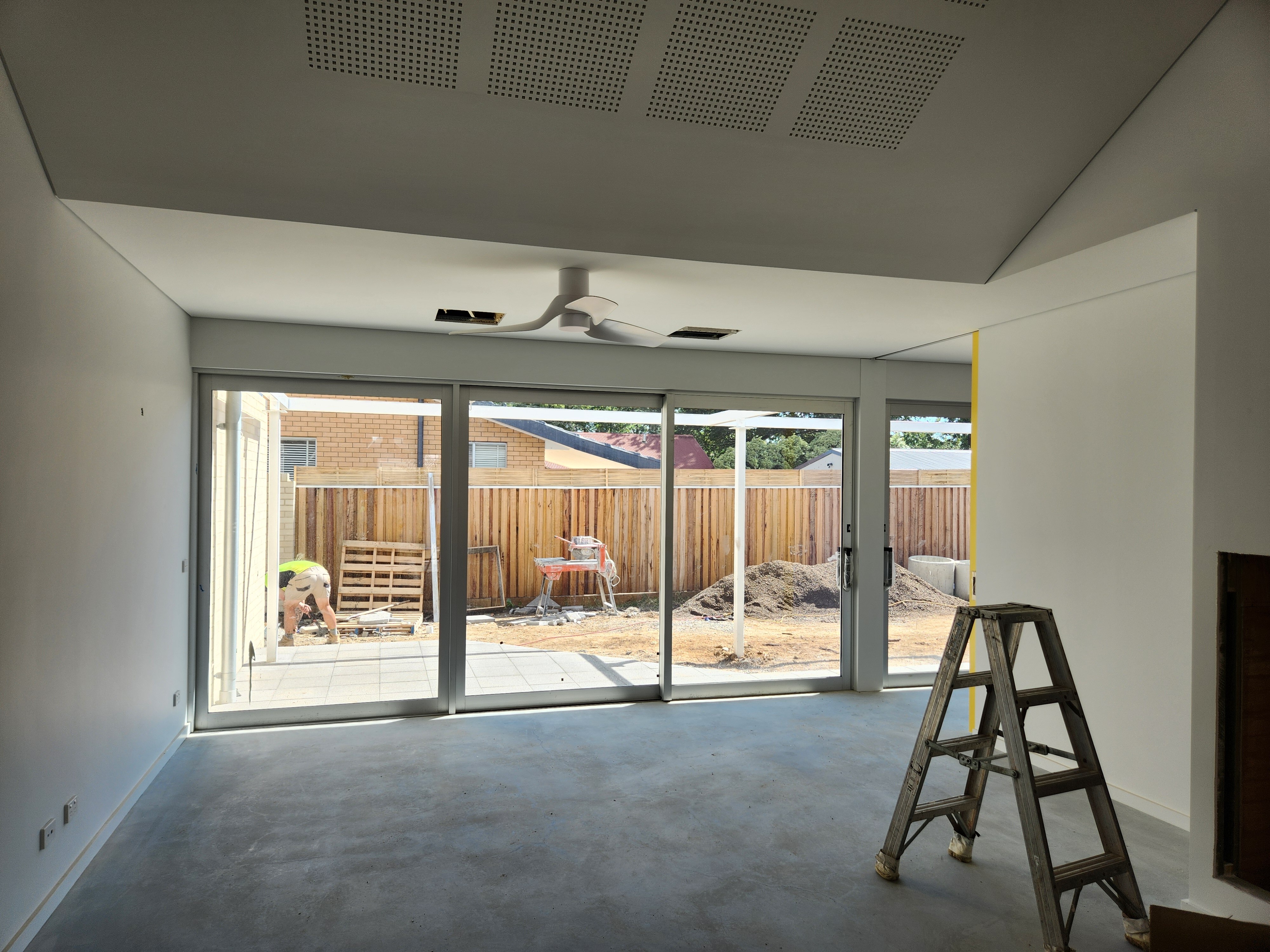 A room in a building that is partially constructed.