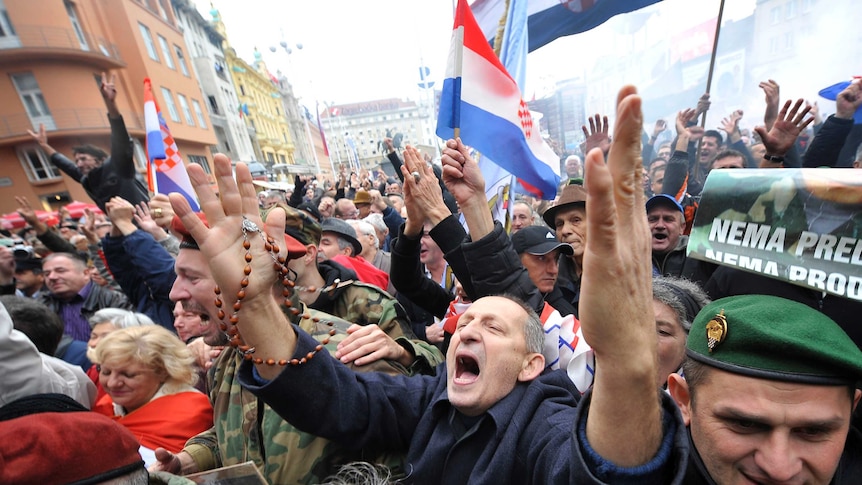 Crowds in the Croatian capital Zagreb cheer after hearing two former generals had been acquitted of war crimes.