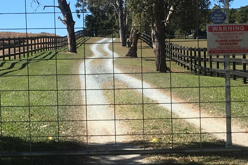 The gravel road at the rural property in Wamuran is being treated as a crime scene.
