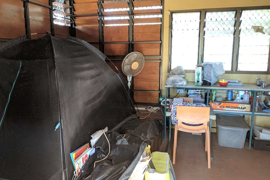 Teacher accommodation at Buluhkaduru homeland school, a tent inside a room.