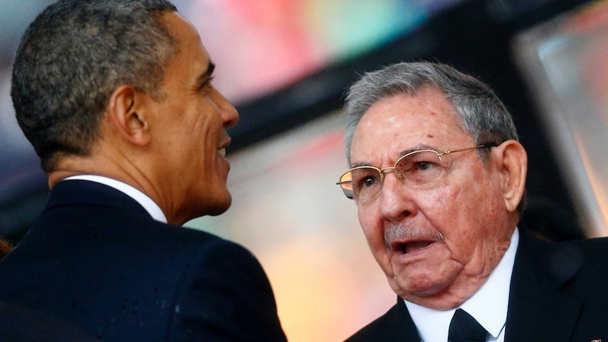 US president Barack Obama greets Cuban president Raul Castro