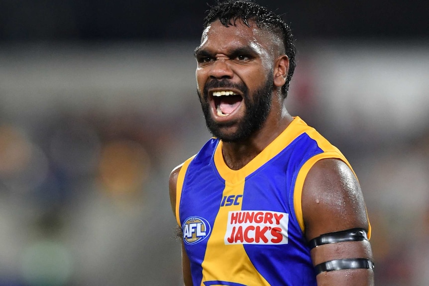 West Coast Eagles forward Liam Ryan celebrates with his fists clenched during an AFL game.