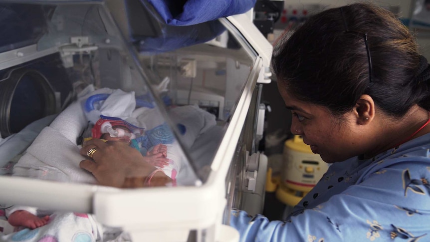 Neetu Srivastav with her son in the Mercy Hospital's neonatal intensive care unit.