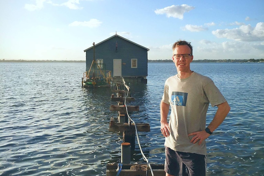 Tom Nattrass with Crawley Edge Boatshed in background