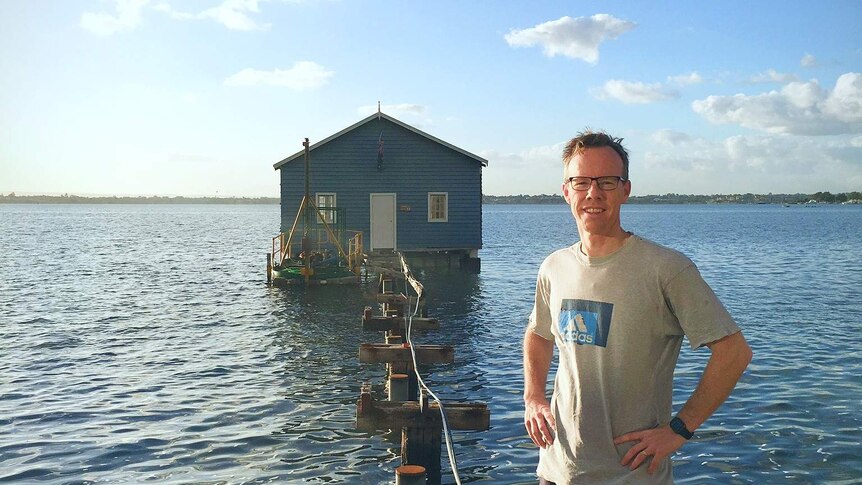 Tom Nattrass with Crawley Edge Boatshed in background