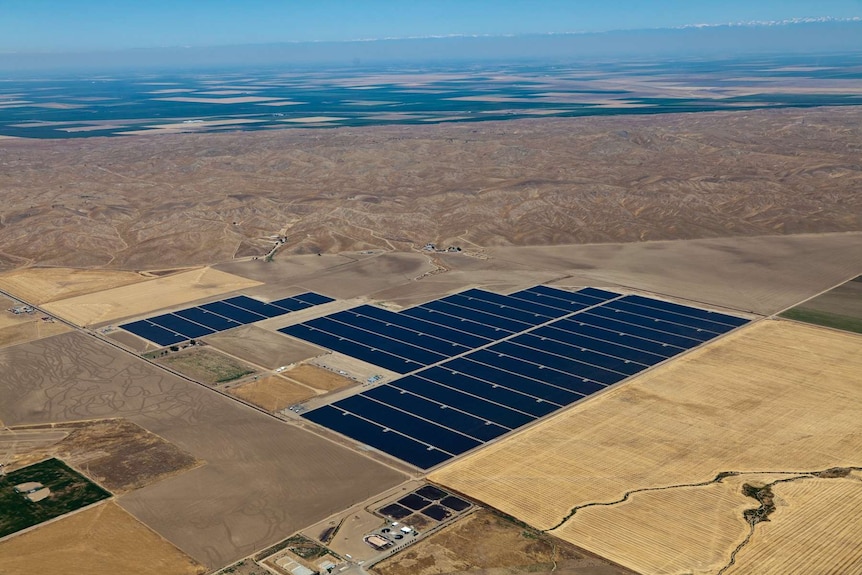 An aerial photograph of a large solar farm.