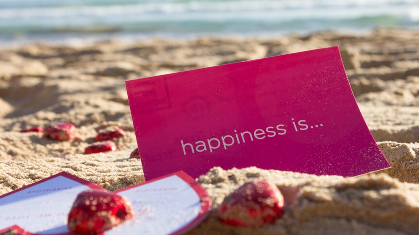 Happiness inspiration card on Manly Beach